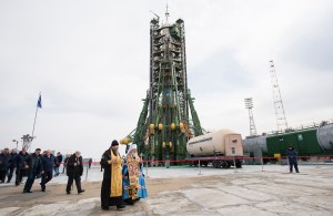 A pair of Orthodox Priests are seen after blessing the Soyuz rocket at the Baikonur Cosmodrome launch pad, Tuesday, March 20, 2018 in Baikonur, Kazakhstan. Expedition 55 Soyuz Commander Oleg Artemyev of Roscosmos, Ricky Arnold and Drew Feustel of NASA are scheduled to launch to the International Space Station aboard the Soyuz MS-08 spacecraft on Wednesday, March, 21.