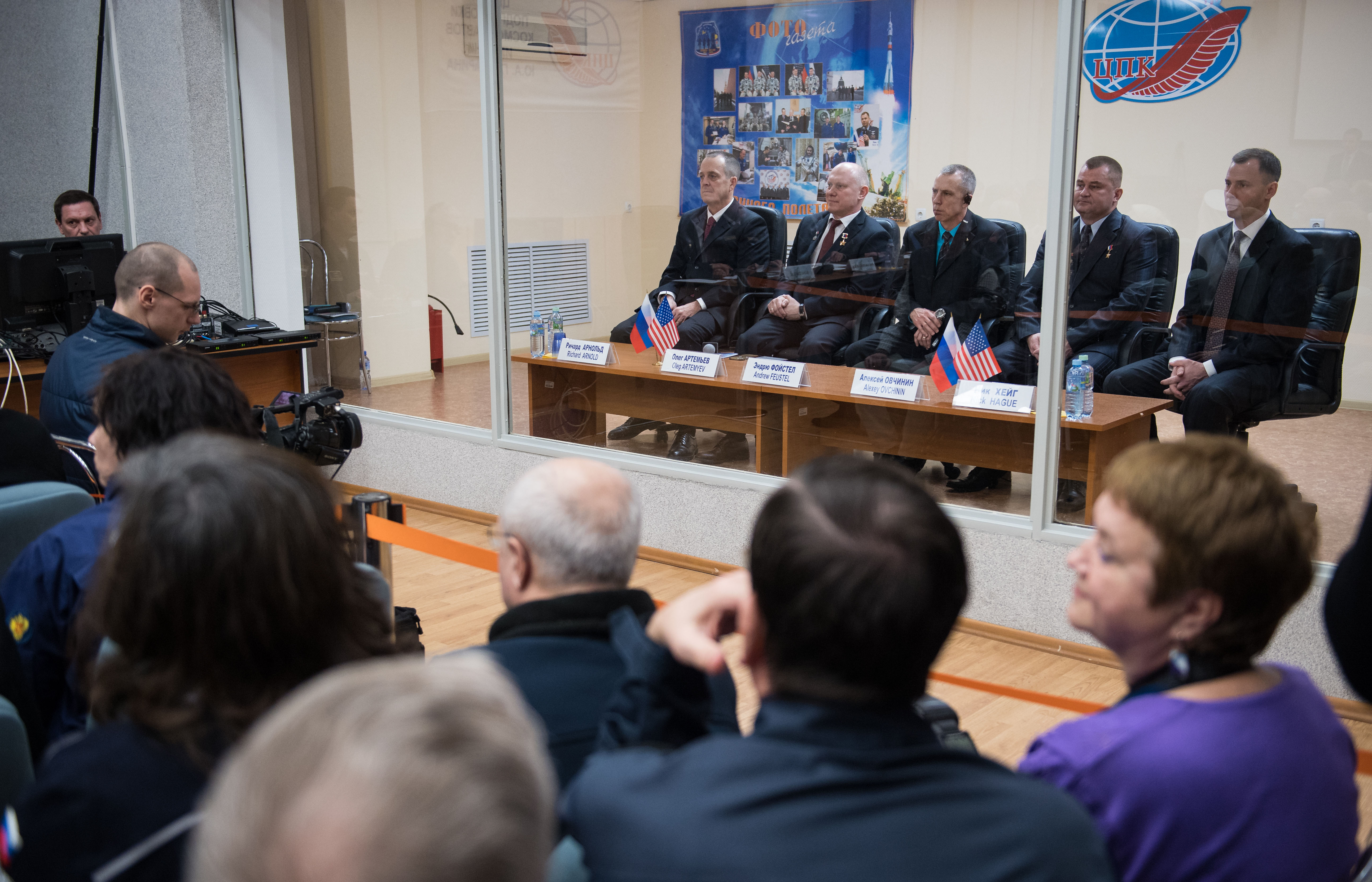 Expedition 55 prime crew members Ricky Arnold of NASA, left, Oleg Artemyev of Roscosmos, second from left, and Drew Feustel of NASA, center, are seen with backup crew members Alexey Ovchinin of Roscosmos, second from right, and Nick Hague of NASA, right, during the State Commission meeting to approve the Soyuz launch of Expedition 55 to the International Space Station, Tuesday, March 20, 2018. Arnold, Artemyev, and Feustel are scheduled to launch to the International Space Station aboard the Soyuz MS-08 spacecraft on Wednesday, March, 21.