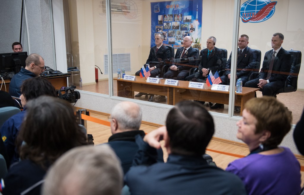 Expedition 55 prime crew members Ricky Arnold of NASA, left, Oleg Artemyev of Roscosmos, second from left, and Drew Feustel of NASA, center, are seen with backup crew members Alexey Ovchinin of Roscosmos, second from right, and Nick Hague of NASA, right, during the State Commission meeting to approve the Soyuz launch of Expedition 55 to the International Space Station, Tuesday, March 20, 2018. Arnold, Artemyev, and Feustel are scheduled to launch to the International Space Station aboard the Soyuz MS-08 spacecraft on Wednesday, March, 21.