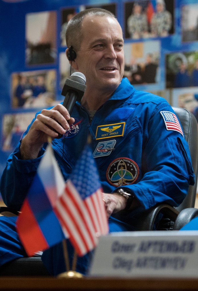 Expedition 55 flight engineer Ricky Arnold answers a question during a press conference, Tuesday, March 20, 2018 a the Cosmonaut Hotel in Baikonur, Kazakhstan. Arnold, Soyuz Commander Oleg Artemyev of Roscosmos, and flight engineer Drew Feustal of NASA are scheduled to launch to the International Space Station aboard the Soyuz MS-08 spacecraft on Wednesday, March 21.