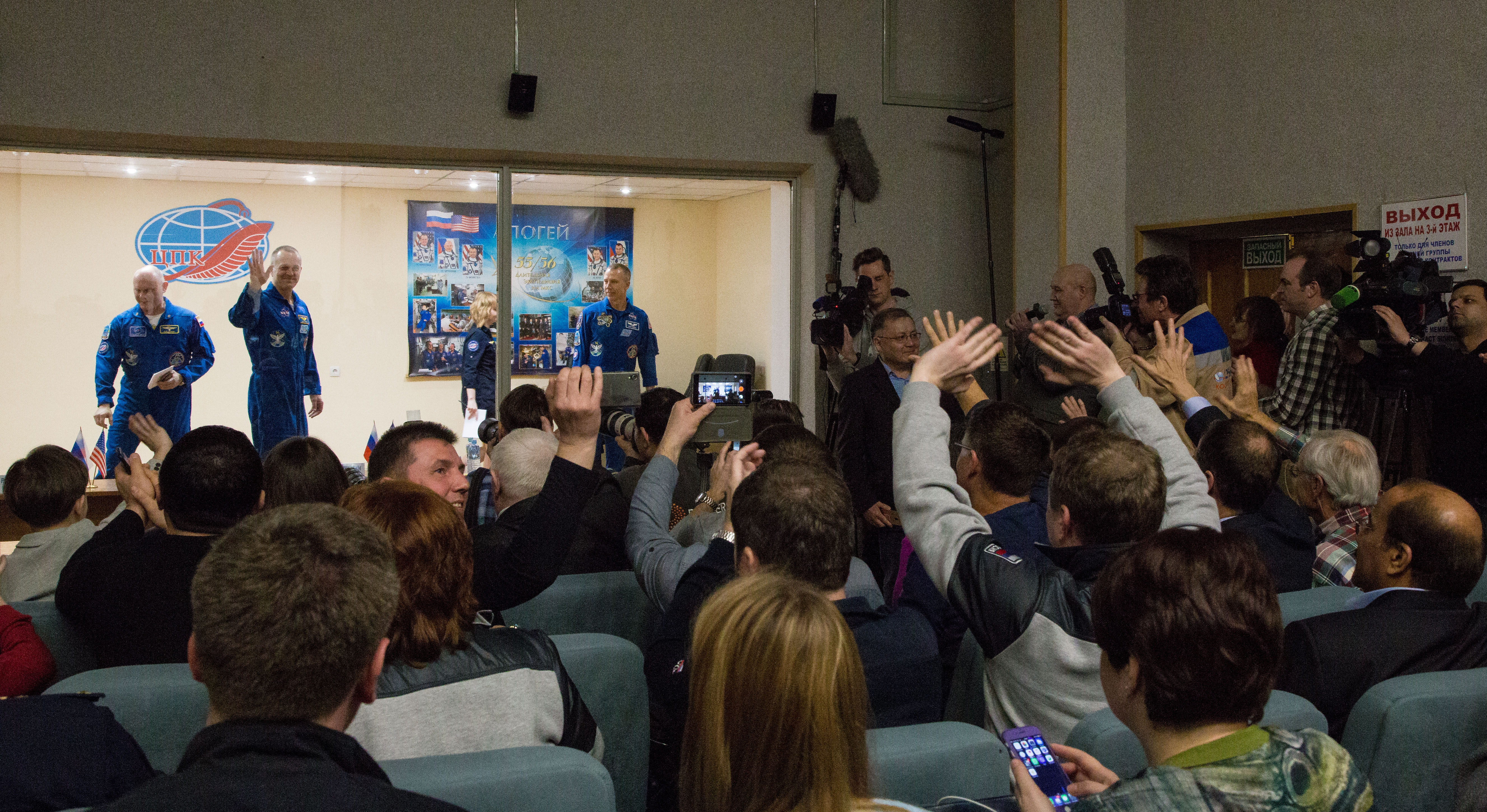 Expedition 55 flight engineer Ricky Arnold of NASA, left, Soyuz Commander Oleg Artemyev of Roscosmos, center, and flight engineer Drew Feustal of NASA, right, are seen at the conclusion of a press conference, Tuesday, March 20, 2018 a the Cosmonaut Hotel in Baikonur, Kazakhstan. Arnold, Artemyev, and Feustal are scheduled to launch to the International Space Station aboard the Soyuz MS-08 spacecraft on Wednesday, March 21.