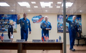 Expedition 55 flight engineer Ricky Arnold of NASA, left, Soyuz Commander Oleg Artemyev of Roscosmos, center, and flight engineer Drew Feustel of NASA, right, are seen at the conclusion of a press conference, Tuesday, March 20, 2018 a the Cosmonaut Hotel in Baikonur, Kazakhstan. Arnold, Artemyev, and Feustal are scheduled to launch to the International Space Station aboard the Soyuz MS-08 spacecraft on Wednesday, March 21.