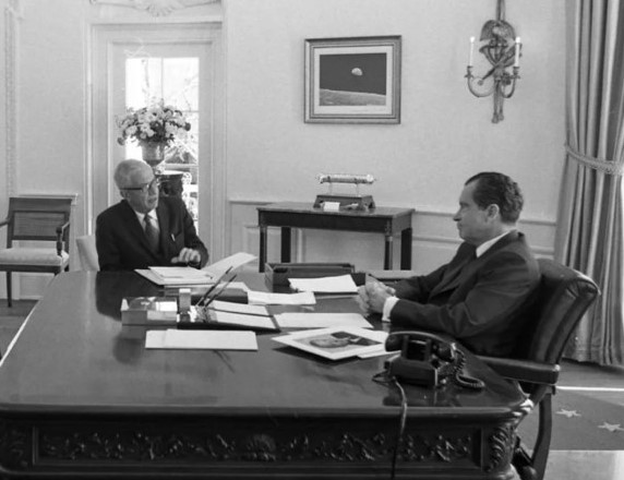 President Richard M. Nixon, right, meets with his science advisor Lee DuBridge in the Oval Office