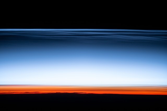 iss062e005412 (Feb. 12, 2020) --- Noctilucent clouds, or night shining clouds, the highest clouds in the Earth's atmosphere, are pictured from the International Space Station orbiting 269 miles above the South Pacific. Noctilucent clouds are only visible when the Sun is below the Earth's horizon and illuminates them.
