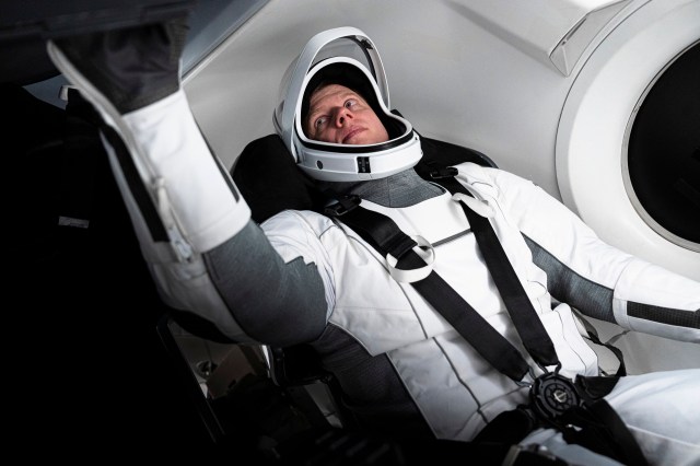 Roscosmos cosmonaut and SpaceX Crew-8 Mission Specialist Alexander Grebenkin is pictured training inside a Dragon mockup crew vehicle at the company's headquarters in Hawthorne, California.