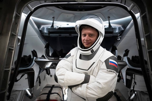 Roscosmos cosmonaut and SpaceX Crew-8 Mission Specialist Alexander Grebenkin is pictured in his pressure suit during a crew equipment integration test at SpaceX headquarters in Hawthorne, California.