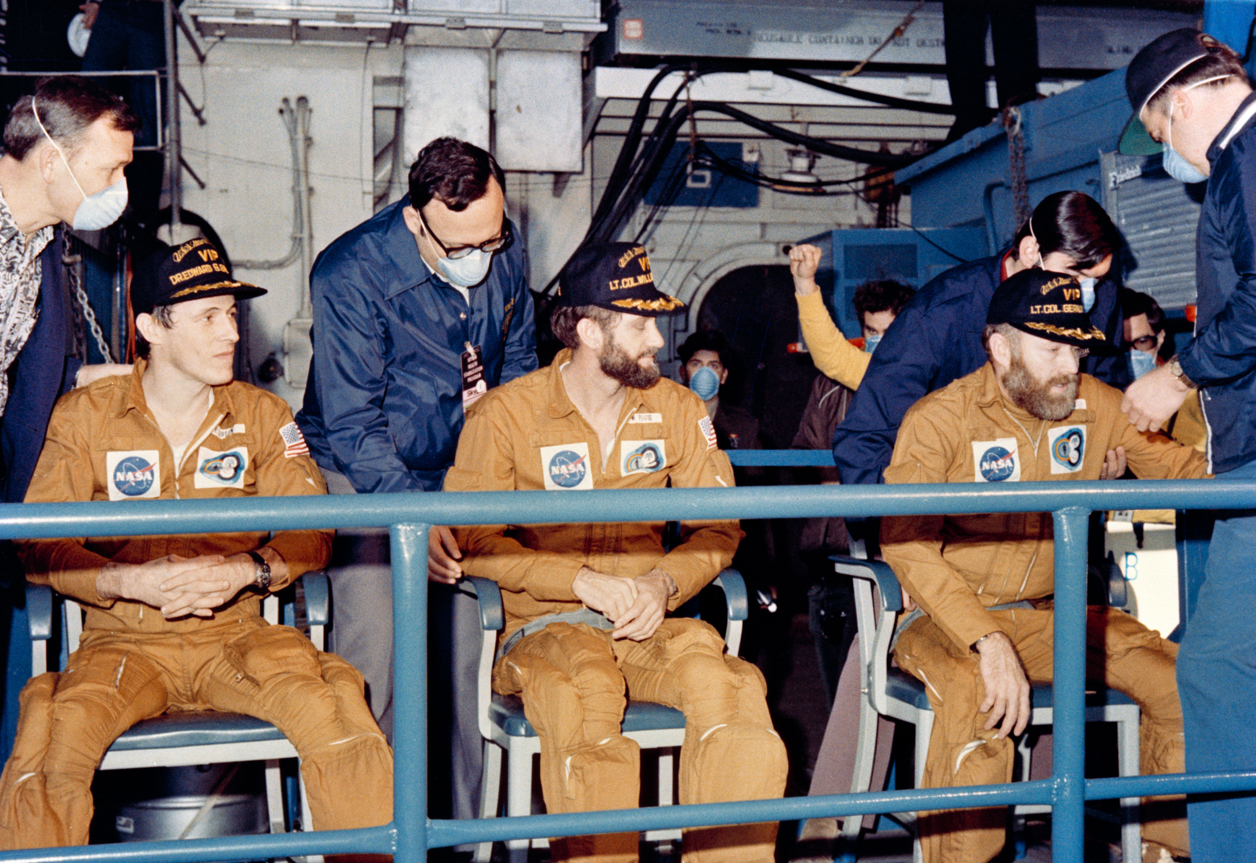 The crewmen of the third and final manned Skylab mission relax on the USS New Orleans, prime recovery ship for their mission, about an hour after their Command Module splashed down at 10:17 a.m. (CDT), Feb. 8, 1974. The splashdown, which occurred 176 statute miles from San Diego, ended 84 record-setting days of flight activity aboard the Skylab space station cluster in Earth orbit.
