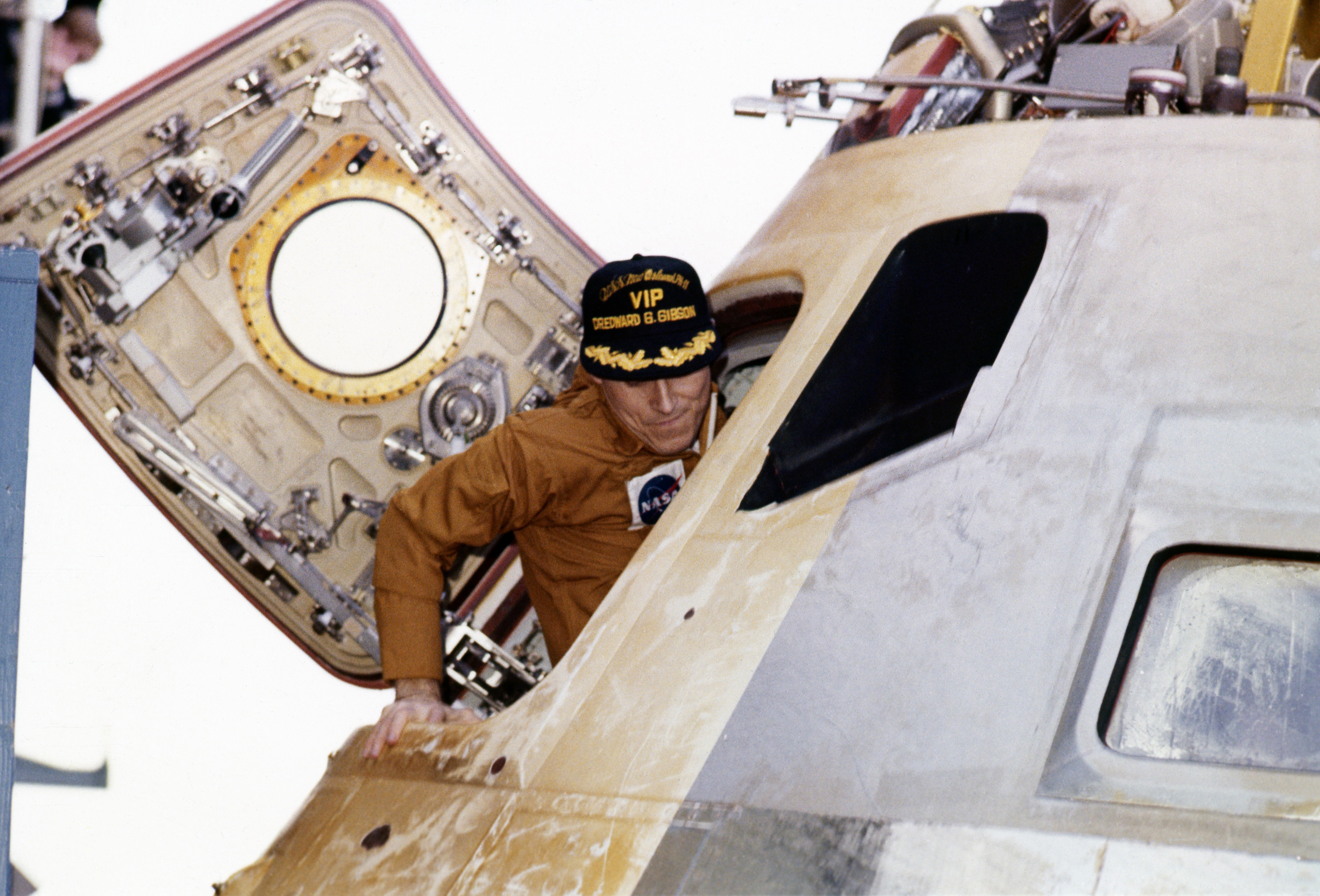 Edward G. Gibson emerges first from the Skylab 4 Command Module (CM)