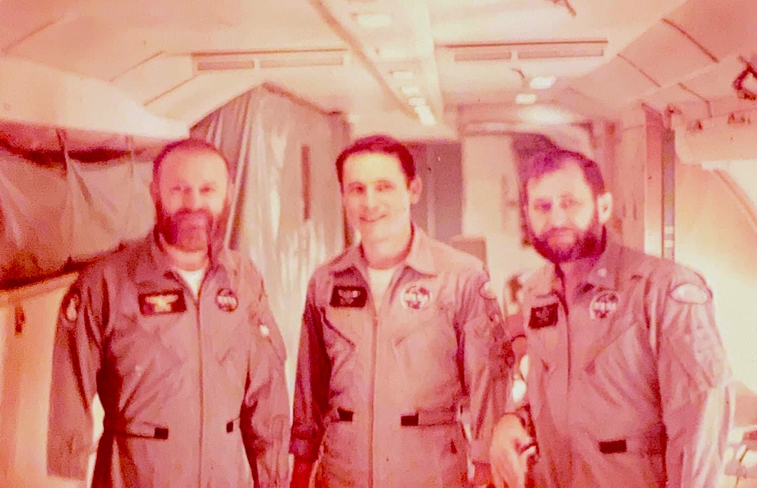 Carr, Gibson, and Pogue aboard the transport jet on their way to Houston