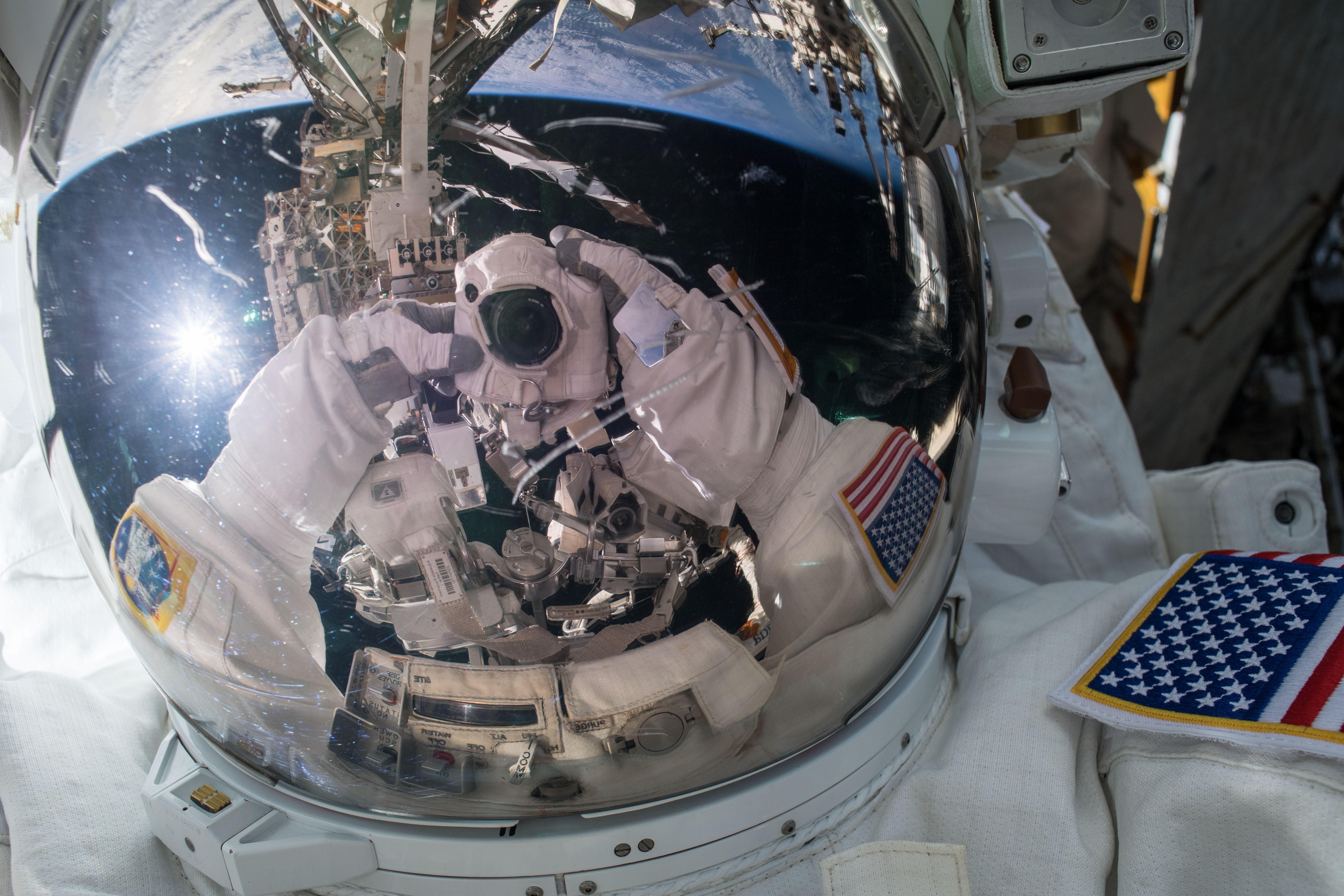 NASA astronaut Ricky Arnold takes an out of this world "space-selfie" during a brief opportunity while conducting a spacewalk with fellow NASA astronaut Drew Feustel (out of frame) on March 29, 2018.