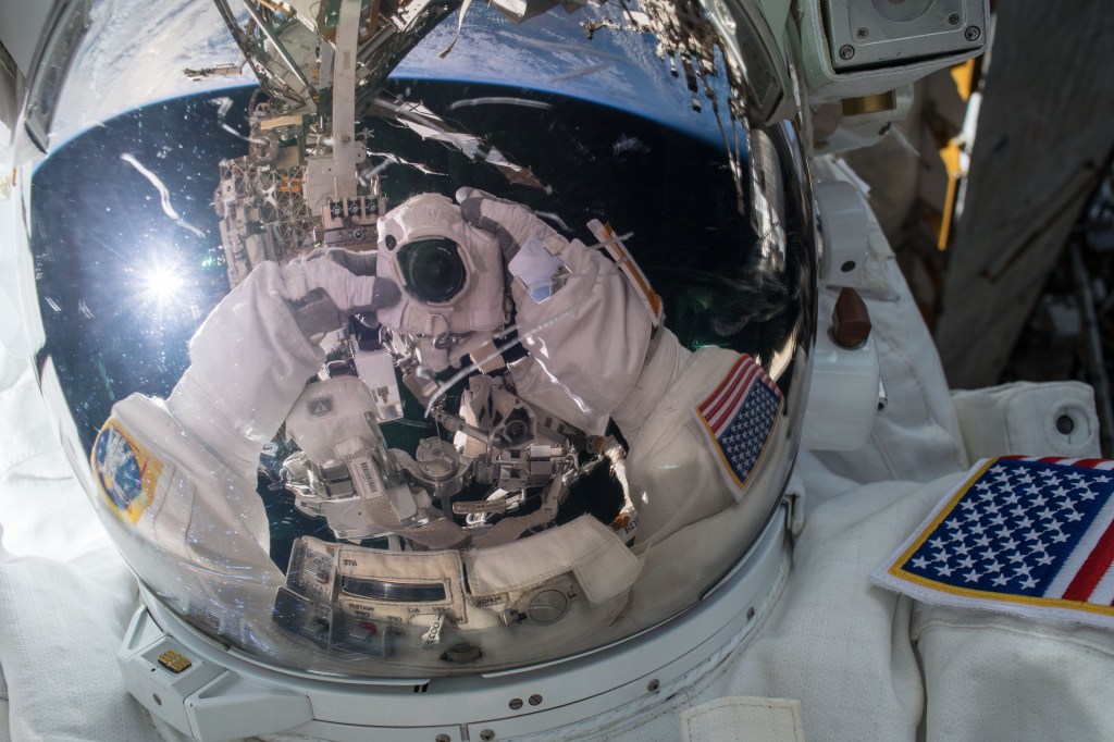 NASA astronaut Ricky Arnold takes an out of this world "space-selfie" during a brief opportunity while conducting a spacewalk with fellow NASA astronaut Drew Feustel (out of frame) on March 29, 2018.