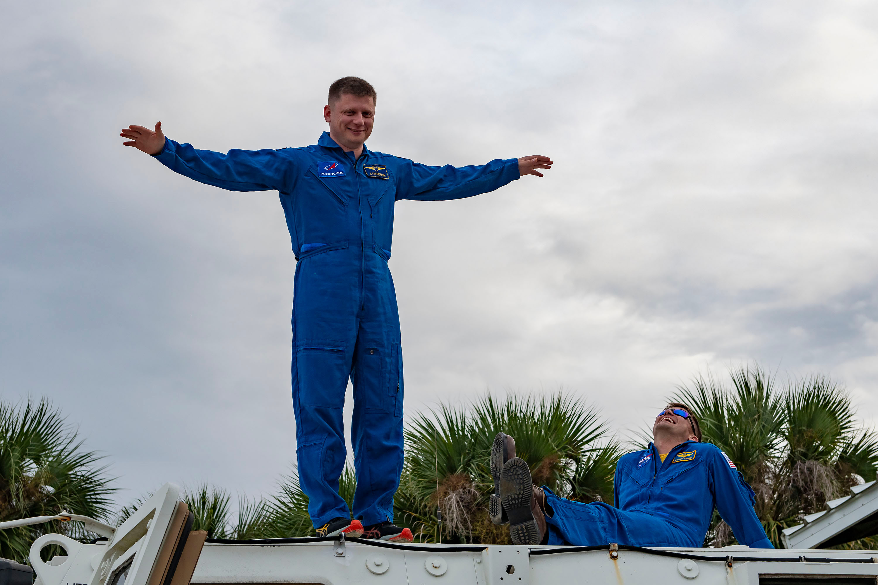 SpaceX Crew-8 Mission Specialist Alexander Grebenkin poses for a photo outside the emergency egress vehicle at NASA's Kennedy Space Center's Launch Pad 39A in Florida. Astronauts would use the emergency egress vehicle to quickly leave the launch area in the unlikely event of an emergency.