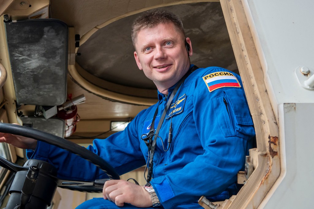 SpaceX Crew-8 Mission Specialist Alexander Grebenkin poses for a photo inside an emergency egress vehicle at NASA's Kennedy Space Center's Launch Pad 39A in Florida. Crews would use the emergency egress vehicle to quickly leave the launch area in case of an emergency.