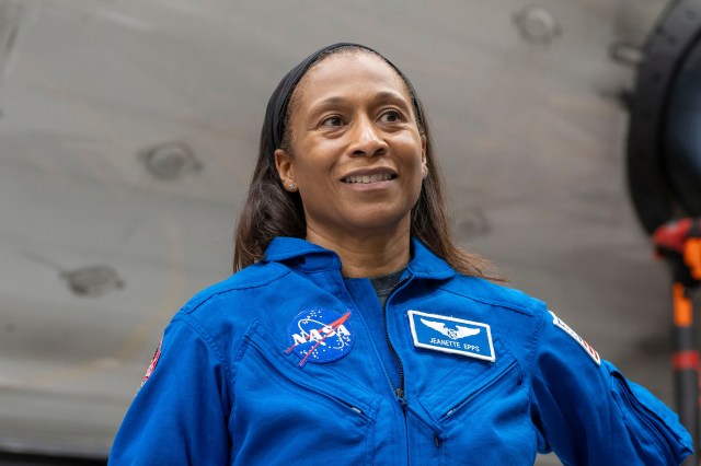 SpaceX Crew-8 Mission Specialist Jeanette Epps poses for a photo inside SpaceX Hangar X at the Kennedy Space Center in Florida. Hangar X supports Falcon 9 rocket refurbishment and houses administration offices.