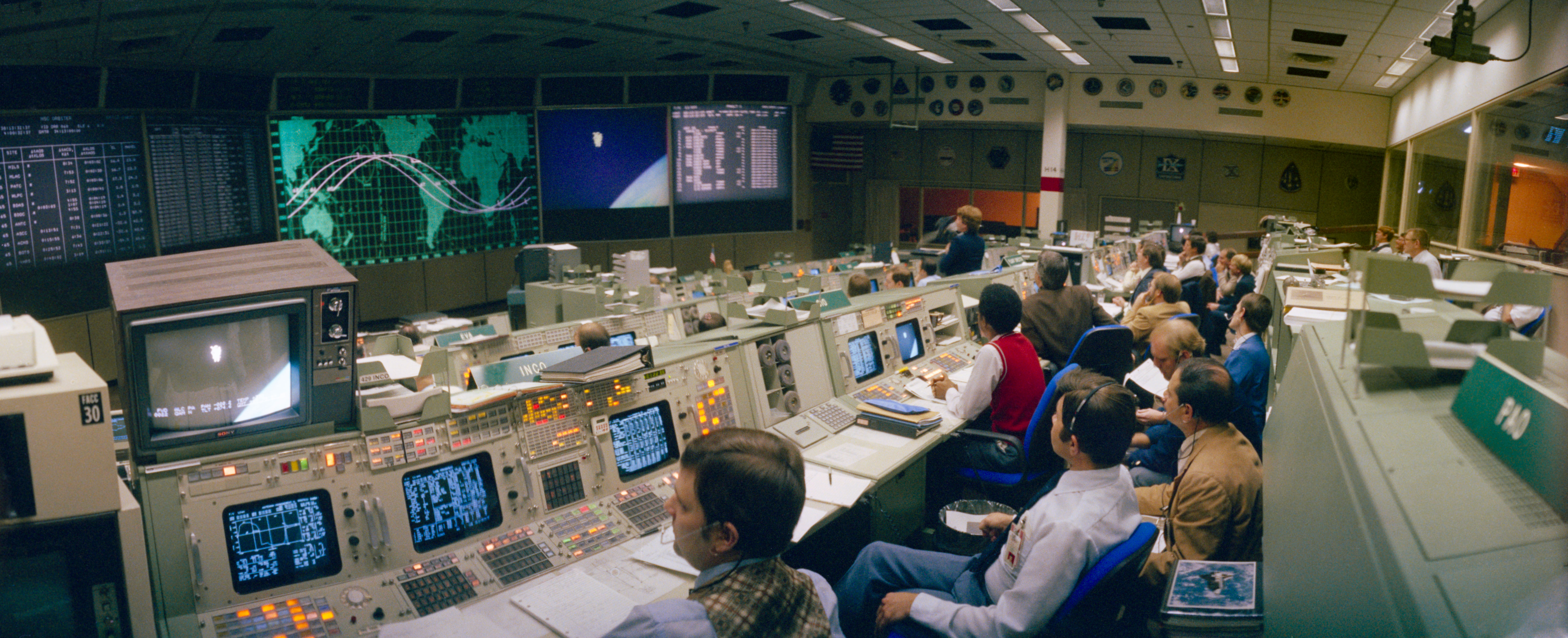 View in Mission Control at NASA’s Johnson Space Center in Houston during the first STS-41B spacewalk