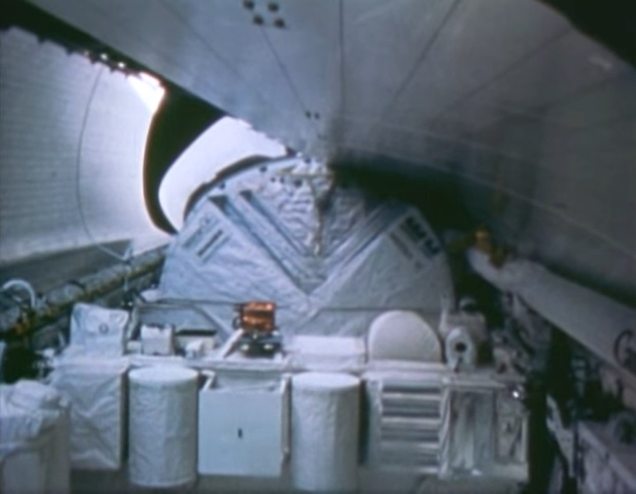The astronauts close the payload bay doors at the end of the STS-41B mission