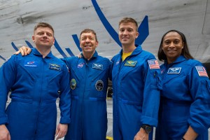 The four crew members that comprise the SpaceX Crew-8 mission pose for a photo inside SpaceX Hangar X at the Kennedy Space Center in Florida. Hangar X supports Falcon 9 rocket refurbishment and houses administration offices. From left are, Mission Specialist Alexander Grebenkin, Pilot Michael Barratt, Commander Matthew Dominick, and Mission Specialist Jeanette Epps.