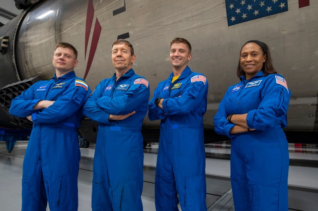 The four crew members that comprise the SpaceX Crew-8 mission pose for a photo inside SpaceX Hangar X at the Kennedy Space Center in Florida. Hangar X supports Falcon 9 rocket refurbishment and houses administration offices. From left are, Mission Specialist Alexander Grebenkin, Pilot Michael Barratt, Commander Matthew Dominick, and Mission Specialist Jeanette Epps.