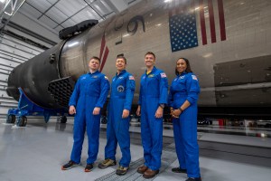 The four crew members that comprise the SpaceX Crew-8 mission pose for a photo inside SpaceX Hangar X at the Kennedy Space Center in Florida. Hangar X supports Falcon 9 rocket refurbishment and houses administration offices. From left are, Mission Specialist Alexander Grebenkin, Pilot Michael Barratt, Commander Matthew Dominick, and Mission Specialist Jeanette Epps.