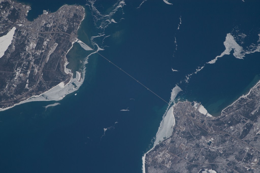An Expedition 55 crew member photographed the Mackinac Bridge which connects the upper and lower peninsulas of the state of Michigan across an area of water separating Lake Michigan and Lake Huron.