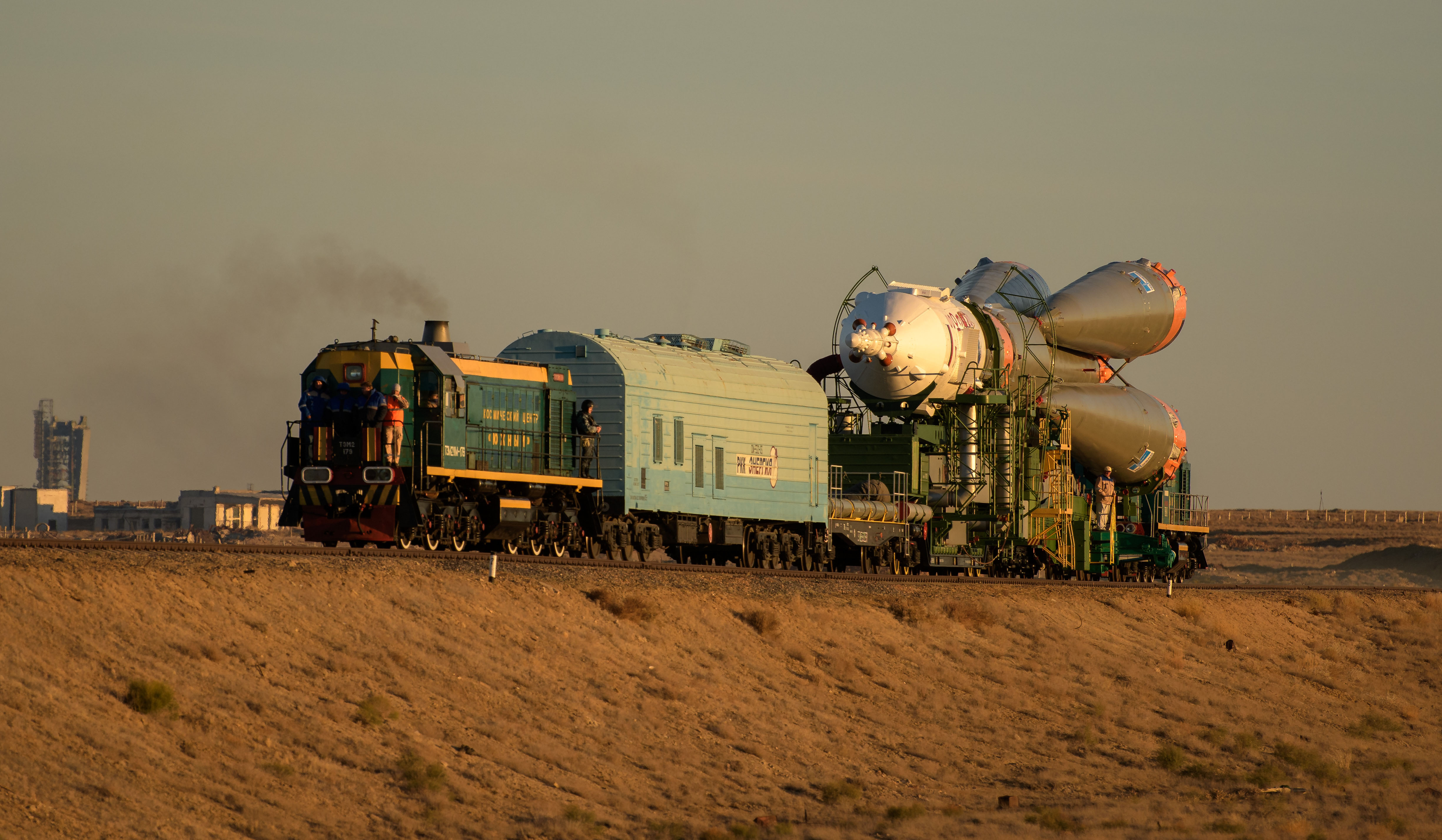 The Soyuz rocket is rolled out by train to the launch pad, Tuesday, Oct. 9, 2018 at the Baikonur Cosmodrome in Kazakhstan. Expedition 57 crewmembers Nick Hague of NASA and Alexey Ovchinin of Roscosmos are scheduled to launch on October 11 and will spend the next six months living and working aboard the International Space Station.