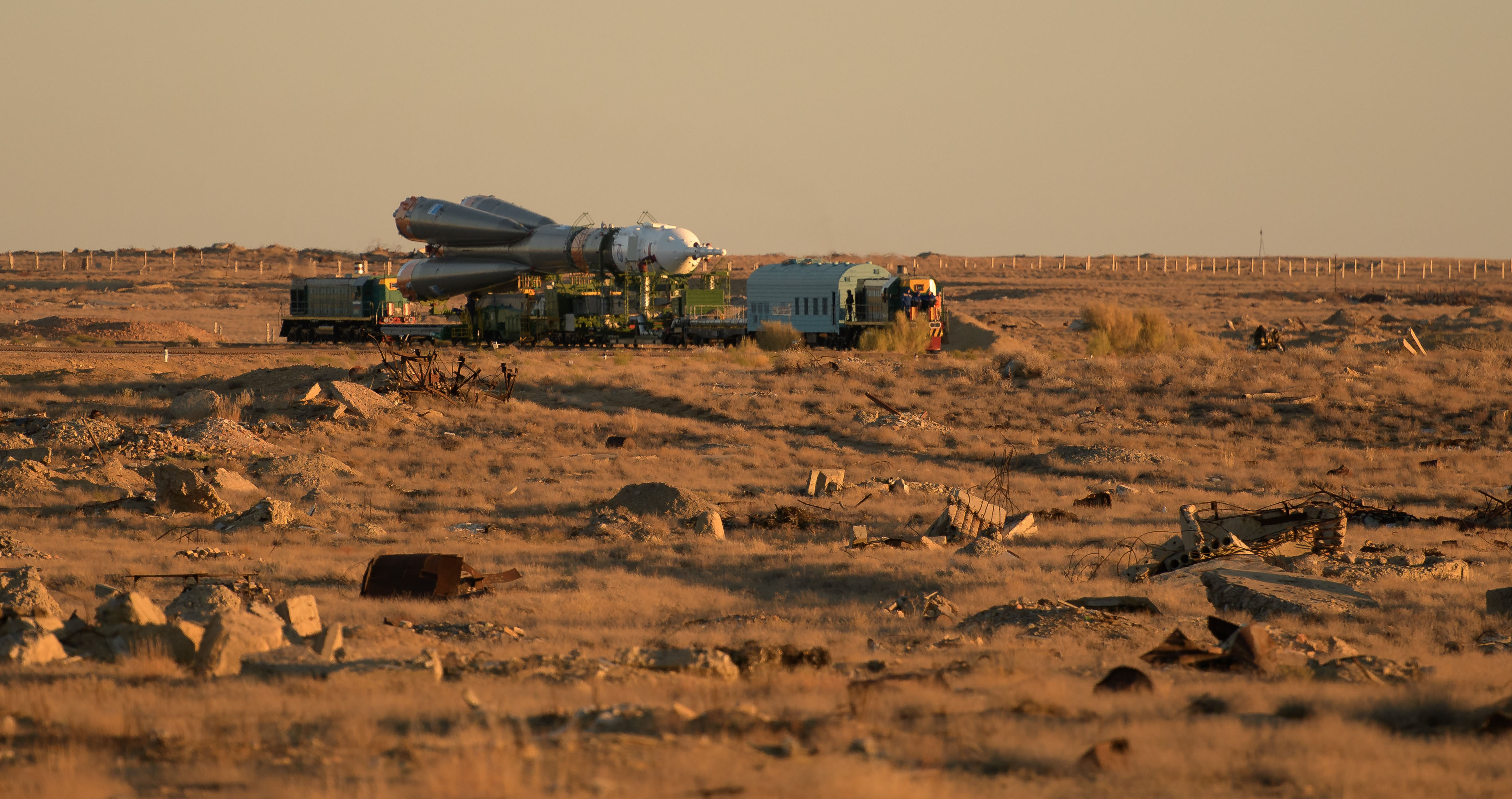 The Soyuz rocket is rolled out by train to the launch pad, Tuesday, Oct. 9, 2018 at the Baikonur Cosmodrome in Kazakhstan. Expedition 57 crewmembers Nick Hague of NASA and Alexey Ovchinin of Roscosmos are scheduled to launch on October 11 and will spend the next six months living and working aboard the International Space Station.