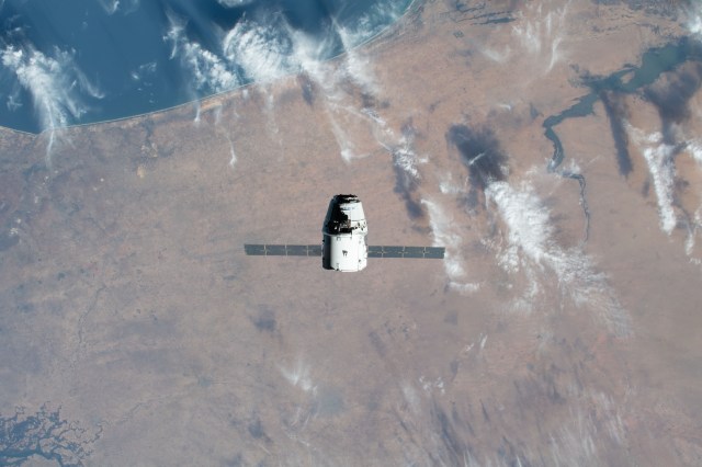 iss062e085644 (March 9, 2020) --- The SpaceX Dragon resupply ship is pictured approaching the International Space Station as both spacecraft were soaring 264 miles above the African nations of Mauritania and Senegal.
