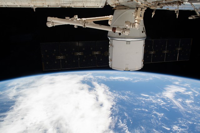 iss062e087334 (March 9, 2020) --- The SpaceX Dragon resupply ship is pictured attached to the International Space Station's Harmony module as both spacecraft were soaring 265 miles above the Atlantic coast of Brazil.