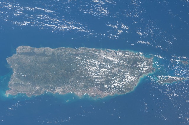 The United States island territory of Puerto Rico and the surrounding blue waters of the Caribbean Sea on its southern coast and the Atlantic Ocean on its northern coast were pictured by an Expedition 55 crew member aboard the International Space Station.