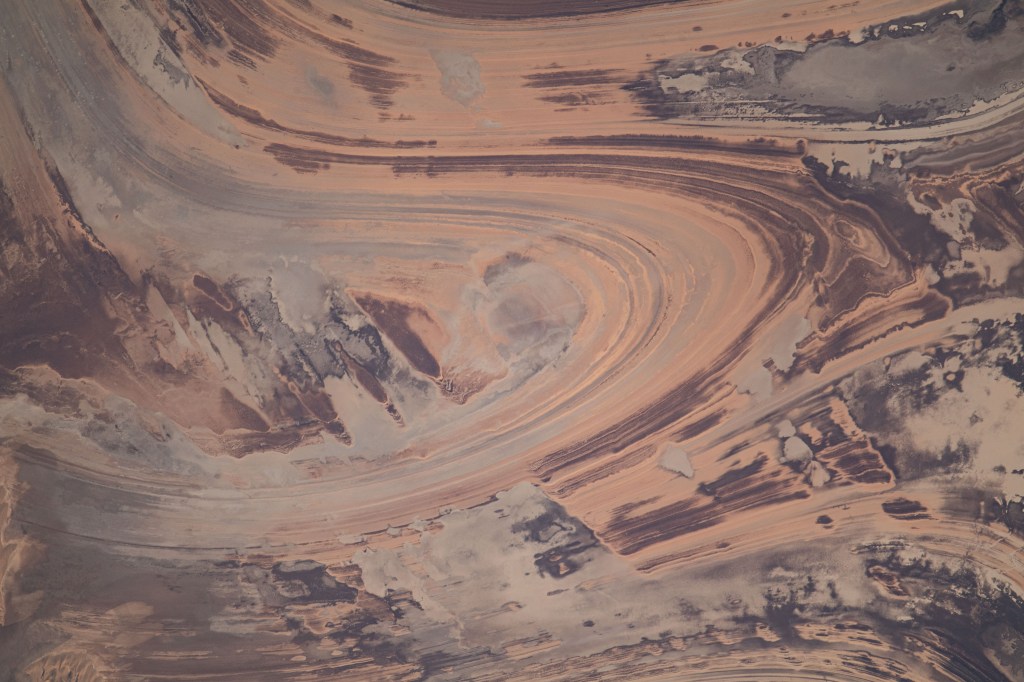 iss070e096895 (Jan. 29, 2024) -- Dust swirls throughout the terrain of Khar Turan National Park as the International Space Station orbited 262 miles above Iran.