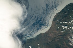 iss070e097875 (Feb. 21, 2024) -- The second-largest freshwater lake in the world and one of Africa's Great Lakes, Lake Tanganyika, is pictured from the International Space Station as it was orbiting 260 miles above. Clouds move in over the lake from the west. The land that lies on the eastern shore is Mahale Mountains National Park.