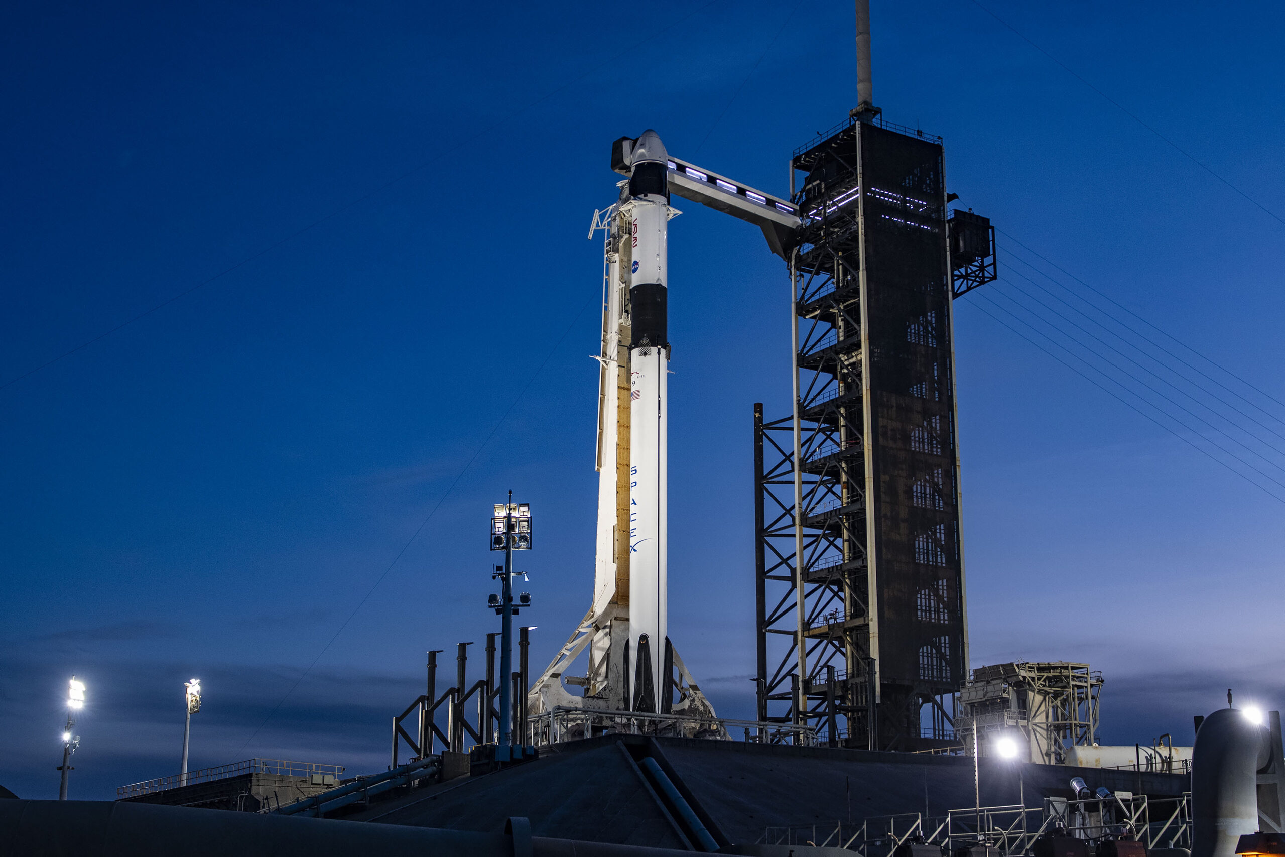 A SpaceX Falcon 9 rocket with the company's Dragon spacecraft on top is seen at sunset on the launch pad at Launch Complex 39A on Wednesday, Feb. 28, 2024, as preparations continue for NASA’s SpaceX Crew-8 mission at NASA’s Kennedy Space Center in Florida. The eighth crew rotation mission with SpaceX and the ninth flight of Dragon with people as part of the agency’s Commercial Crew Program is slated to carry NASA astronauts Matthew Dominick, Michael Barratt, and Jeanette Epps, and Roscosmos cosmonaut Alexander Grebenkin to the International Space Station from Launch Complex 39A at 11:16 p.m. EST on Saturday, March 2.