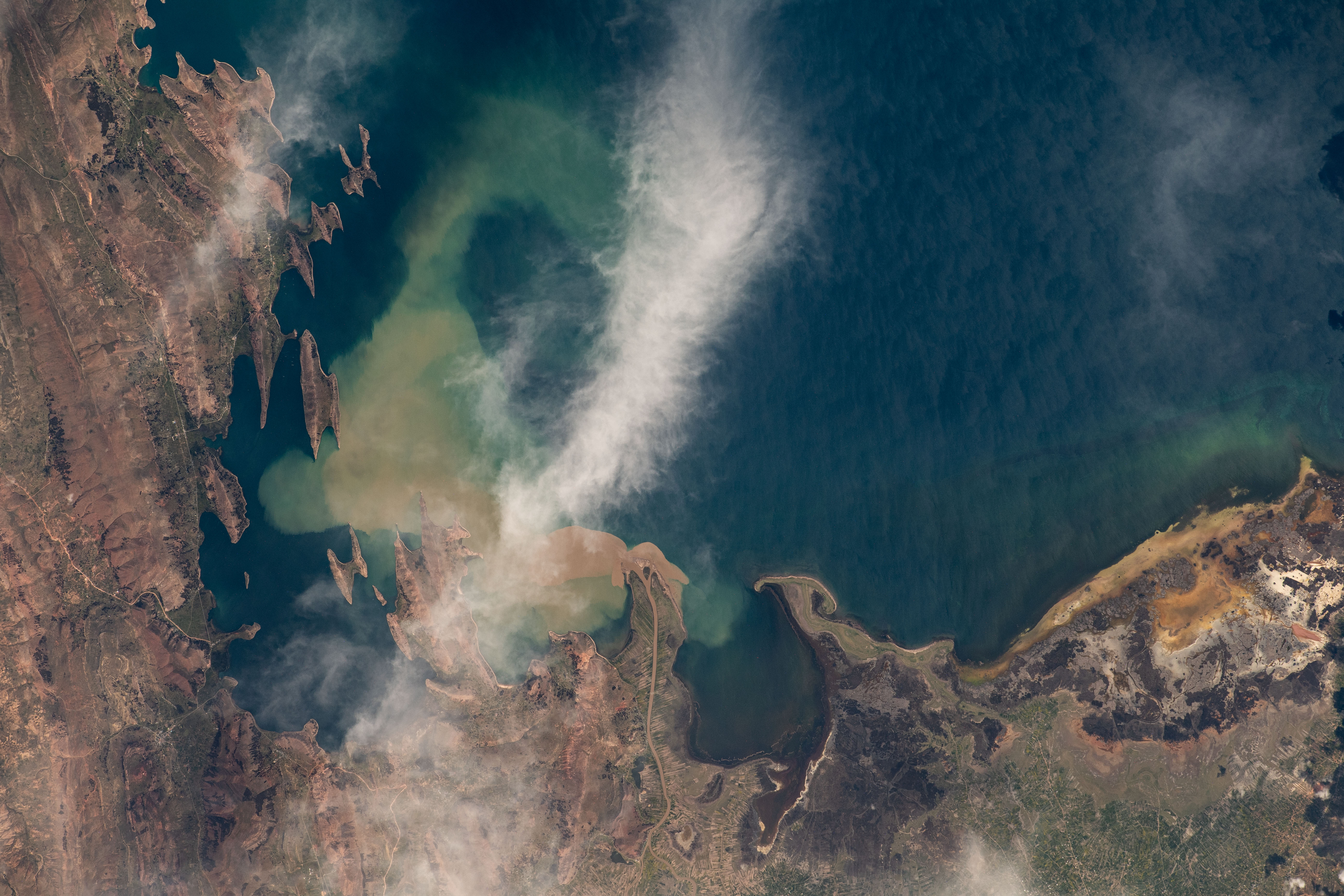 iss070e100460 (Feb. 19, 2024) -- The northeastern shoreline of Lake Titicaca, the highest lake in the world, was pictured from the International Space Station as it orbited 261 miles above Peru.