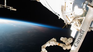 iss070e106149 (March 4, 2024) -- Orbital sunset envelopes Earth as the International Space Station orbited 262 miles above southern Africa. In the foreground is the Canadarm2 robotic arm.