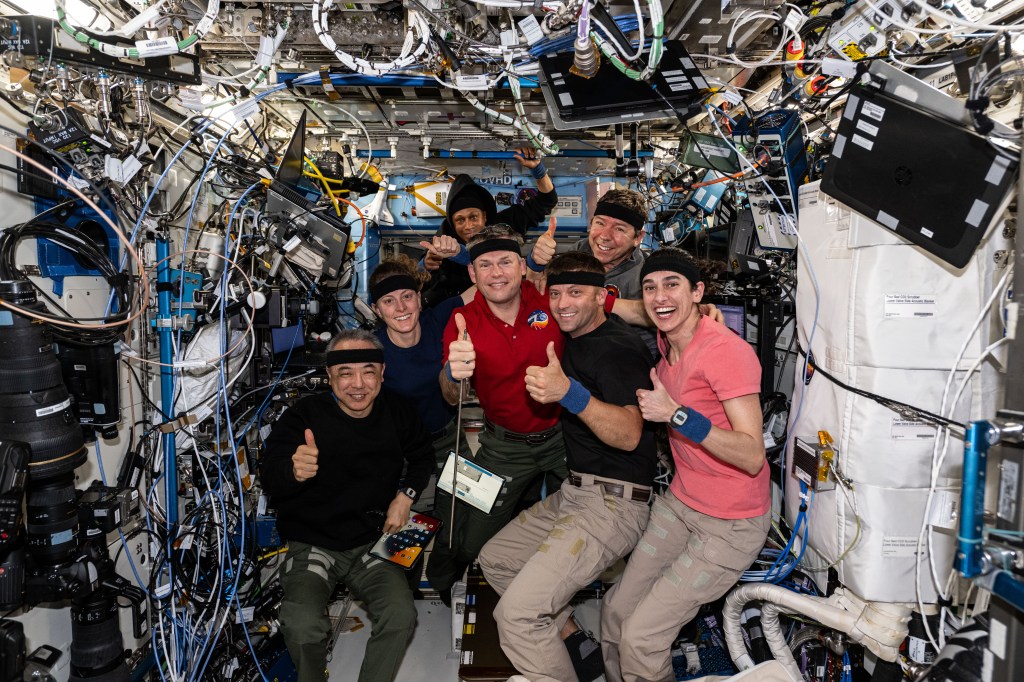 iss070e113196 (March 11, 2024) -- Expedition 70 crew members pose for a portrait ahead of Crew-7's departure from the International Space Station. From left are Satoshi Furukawa of JAXA (Japan Aerospace Exploration Agency), Loral O'Hara and Jeanette Epps of NASA, Andreas Mogensen of ESA (European Space Agency), Michael Barratt, Matthew Dominick, and Jasmin Moghbeli of NASA. NASA's SpaceX Crew-7 departed the space station on Monday, March 11 before splashing down off the coast of Florida on Tuesday, March 12.