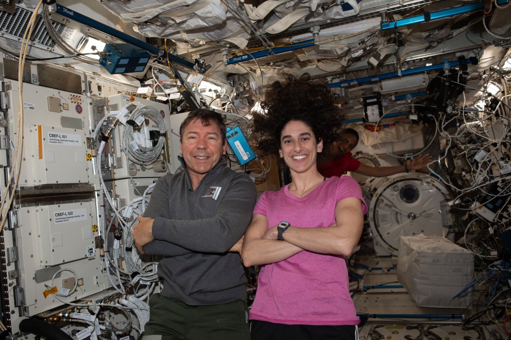 iss070e110706 (March 10, 2024) -- NASA astronauts Michael Barratt and Jasmin Moghbeli pose for a portrait ahead of Crew-7's departure from the International Space Station.