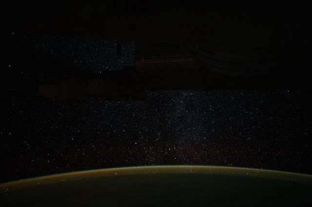 iss060e002064 (June 29, 2019) -- A starry Milky Way glitters above Earth's tranquil atmospheric glow as the International Space Station orbited 266 miles above the Pacific Ocean off the northwest coast of New Zealand.