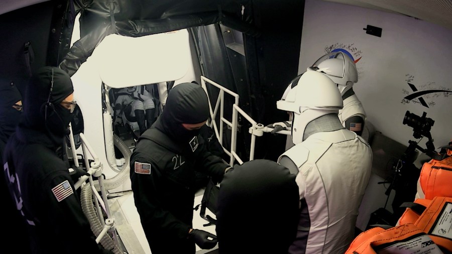 NASA's SpaceX Crew-8 crew members enter Dragon Endeavour ahead of launch from Launch Complex 39A at Kennedy Space Center on Sunday, March 3, 2024.