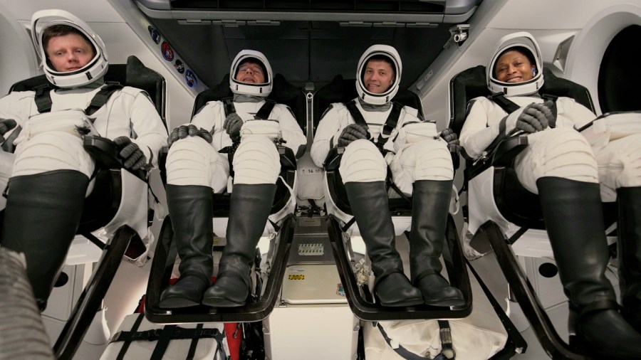 Members of NASA’s SpaceX Crew-8 from right to left, NASA astronauts Jeanette Epps, mission specialist; Matthew Dominick, commander; Michael Barratt, pilot; and Roscosmos cosmonaut Alexander Grebenkin, mission specialist, wave as they participate in a countdown dress rehearsal at the agency’s Kennedy Space Center in Florida on Monday, Feb. 26, 2024, to prepare for the upcoming Crew-8 launch to the International Space Station. Liftoff of the eighth crew rotation mission with SpaceX to the station and the ninth flight of Dragon with people as part of the agency’s Commercial Crew Program from Launch Complex 39A is targeted for 10:53 p.m. on Sunday, March 3.