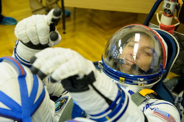 Expedition 52 flight engineer Randy Bresnik of NASA has his Russian Sokol Suit pressure checked in preparation for launch aboard the Soyuz MS-05 spacecraft, Friday, July 28, 2017 in Baikonur, Kazakhstan. Bresnik, flight engineer Sergei Ryazanskiy of Roscosmos, and flight engineer Paolo Nespoli of ESA (European Space Agency), launched at 11:41 a.m. EDT on July 28 (9:41 p.m. Baikonur time) to begin a four and a half month mission aboard the International Space Station.