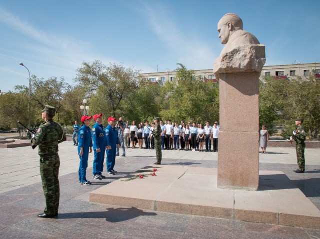 In the town of Baikonur, Kazakhstan, Expedition 53-54 backup crewmembers Shannon Walker of NASA, Anton Shkaplerov of Roscosmos and Scott Tingle of NASA pay tribute after laying flowers at the statue of Russia’s great space designer Sergey Korolev in a traditional ceremony Sept. 8. They are serving as backups to the prime crewmembers, Joe Acaba of NASA, Alexander Misurkin of Roscosmos and Mark Vande Hei of NASA, who will launch on Sept. 13 from the Baikonur Cosmodrome in Kazakhstan on the Soyuz MS-06 spacecraft for a five and a half month mission on the International Space Station.