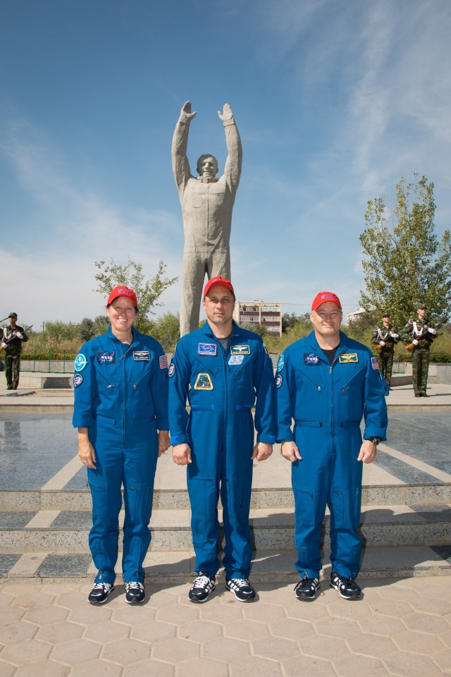 In the town of Baikonur, Kazakhstan, Expedition 53-54 backup crewmembers Shannon Walker of NASA (left), Anton Shkaplerov of Roscosmos (center) and Scott Tingle of NASA (right) pose for photos Sept. 8 in front of a statue of Yuri Gagarin, the first human to fly in space. They are serving as backups to the prime crewmembers, Joe Acaba of NASA, Alexander Misurkin of Roscosmos and Mark Vande Hei of NASA, who will launch on Sept. 13 from the Baikonur Cosmodrome in Kazakhstan on the Soyuz MS-06 spacecraft for a five and a half month mission on the International Space Station.