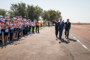 Expedition 53-54 crewmembers Joe Acaba of NASA (left), Alexander Misurkin of Roscosmos (center) and Mark Vande Hei of NASA (right) are greeted by local students after arriving at their launch site at the Baikonur Cosmodrome in Kazakhstan Sept. 6 following a flight from their training base in Star City, Russia for final pre-launch training. They will launch Sept. 13 on the Soyuz MS-06 spacecraft from the Baikonur Cosmodrome for a five and a half month mission on the International Space Station.