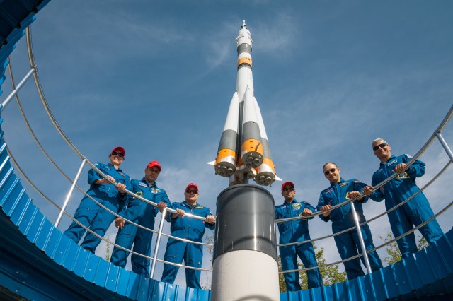 At the Cosmonaut Hotel crew quarters in Baikonur, Kazakhstan, the Expedition 53-54 prime and backup crewmembers pose for photos around a Soyuz rocket mock up Sept. 8 as part of pre-launch activities. From left to right are the backup crewmembers, Shannon Walker of NASA, Anton Shkaplerov of Roscosmos and Scott Tingle of NASA and the prime crewmembers, Joe Acaba of NASA, Alexander Misurkin of Roscosmos and Mark Vande Hei of NASA. Acaba, Misurkin and Vande Hei will launch Sept. 13 from the Baikonur Cosmodrome in Kazakhstan on the Soyuz MS-06 spacecraft for a five and a half month mission on the International Space Station.