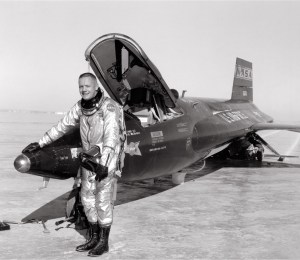 Man standing next to aircraft.