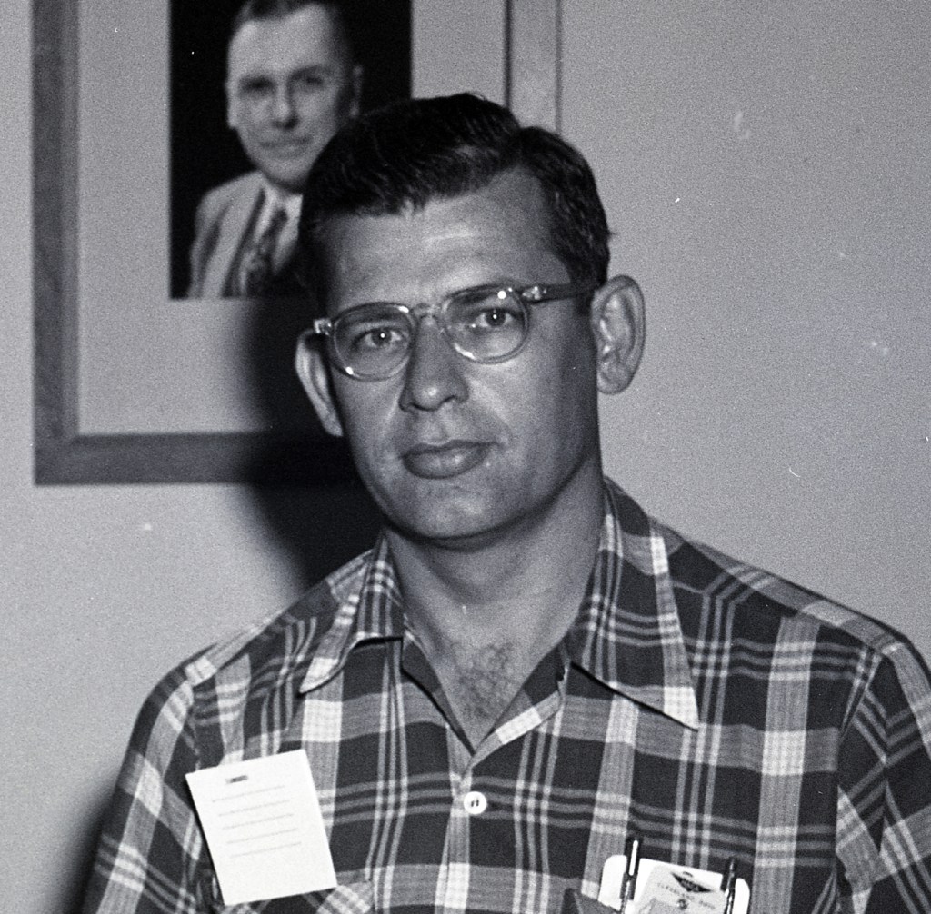 Man in plaid shirt.