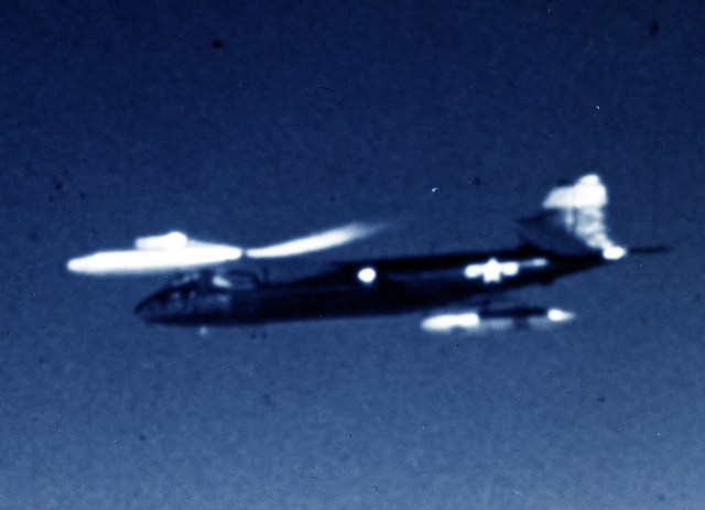 Blurry photo of B-57 in flight.