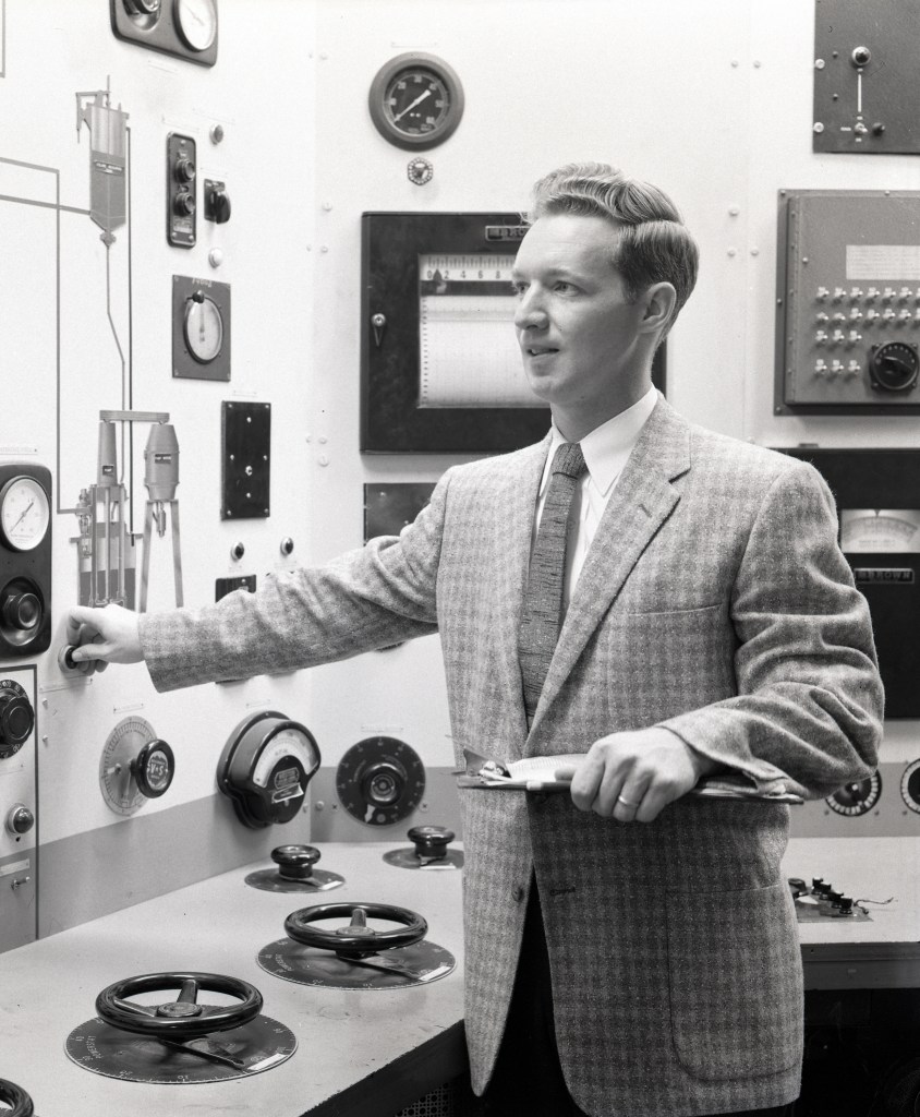 Man in control room.