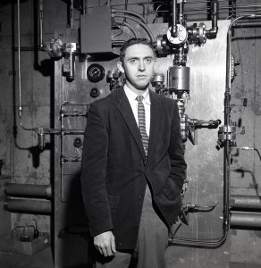 Man in front of equipment.
