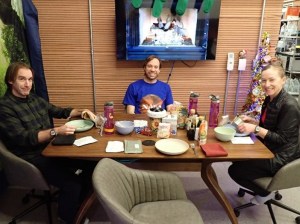 (From left) Ross Brockwell, Nathan Jones, and Kelly Haston share a meal together inside the habitat. Not pictured is Anca Selariu, who was taking the photo. Credit: NASA